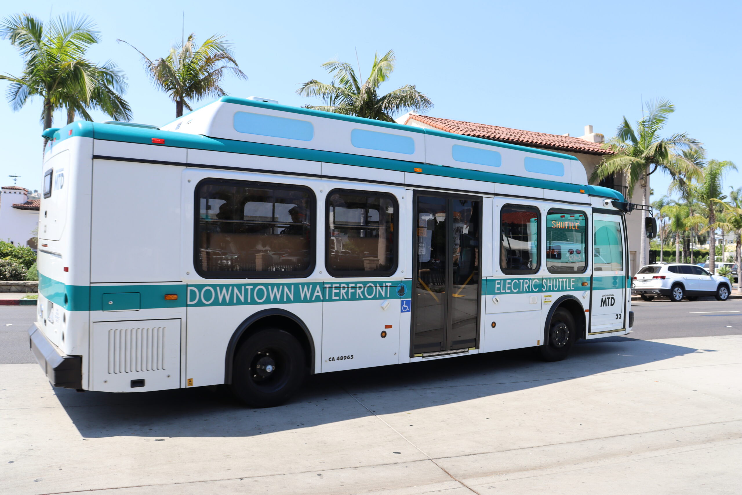 A photo of an MTD shuttle on the streets of Santa Barbara