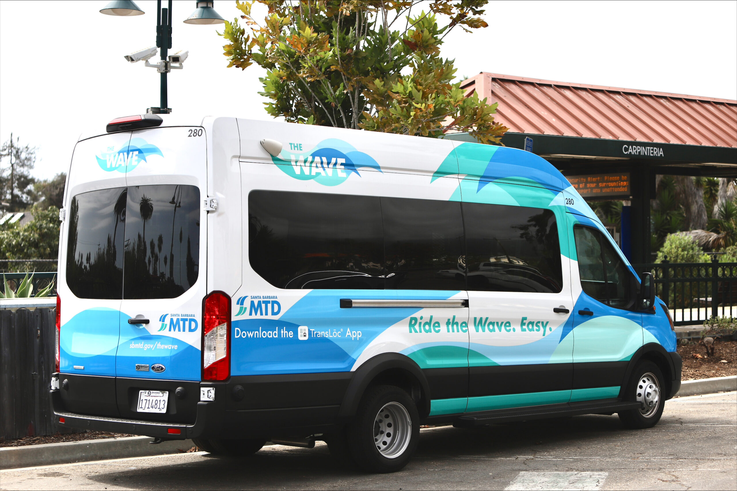 A photo of The Wave van at the Carpinteria Amtrak Station.